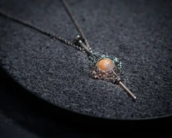 Grindelwald Blutpakt Anhänger mit Kette - Phantastische Tierwesen