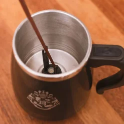 Harry Potter - Hogwarts Tasse mit Rührfunktion und Zauberstab
