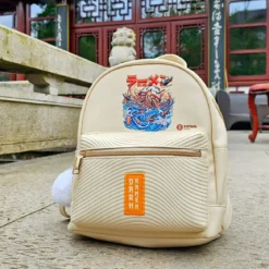 Ilustrata - Dark Ramen Rucksack mit Pom Pom Anhänger beige